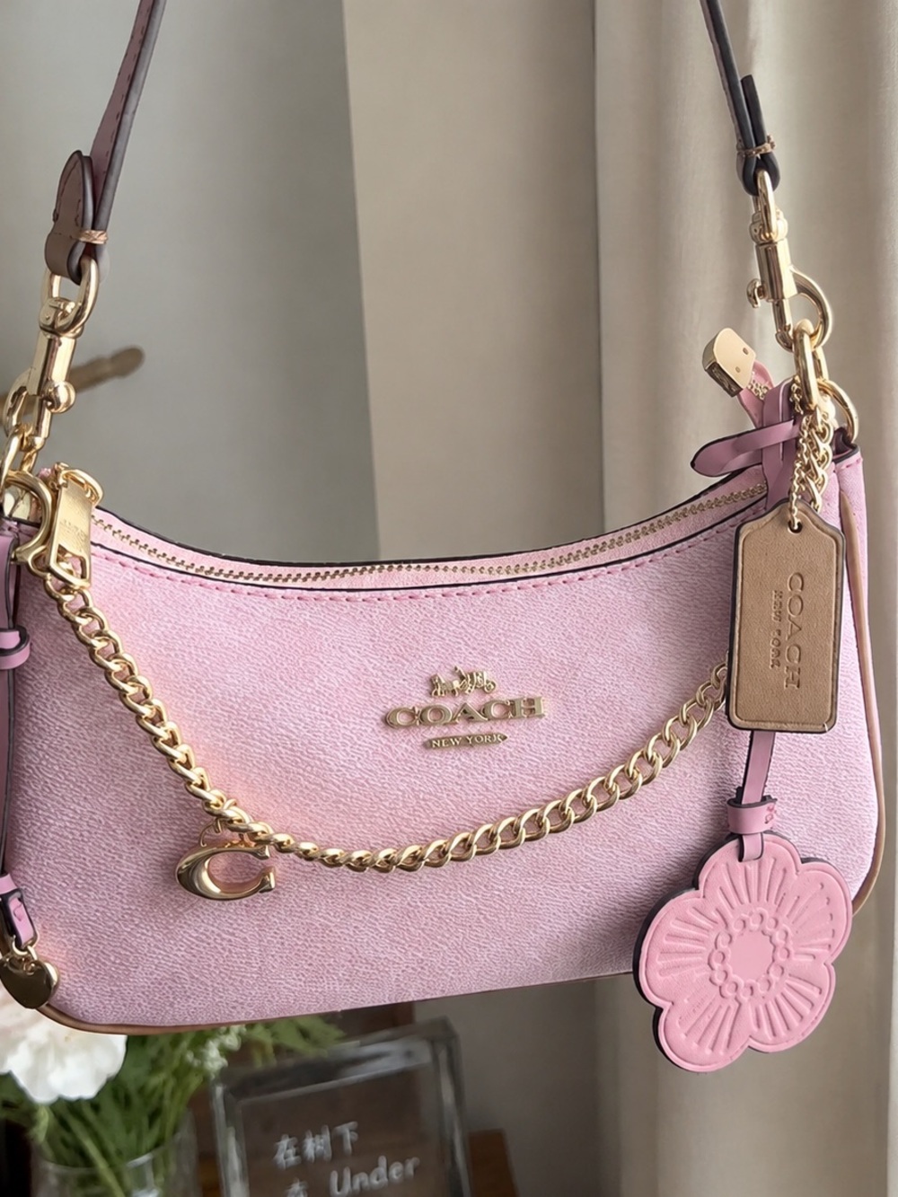 Coach Pink Leather Shoulder Bag with Gold Hardware and Floral Charm